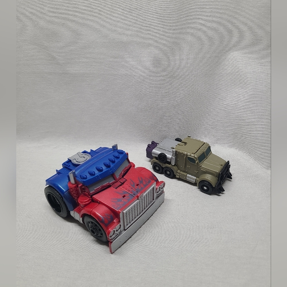 TRANSFORMERS DARK OF THE MOON OPTIMUS PRIME And MEGATRON Lot